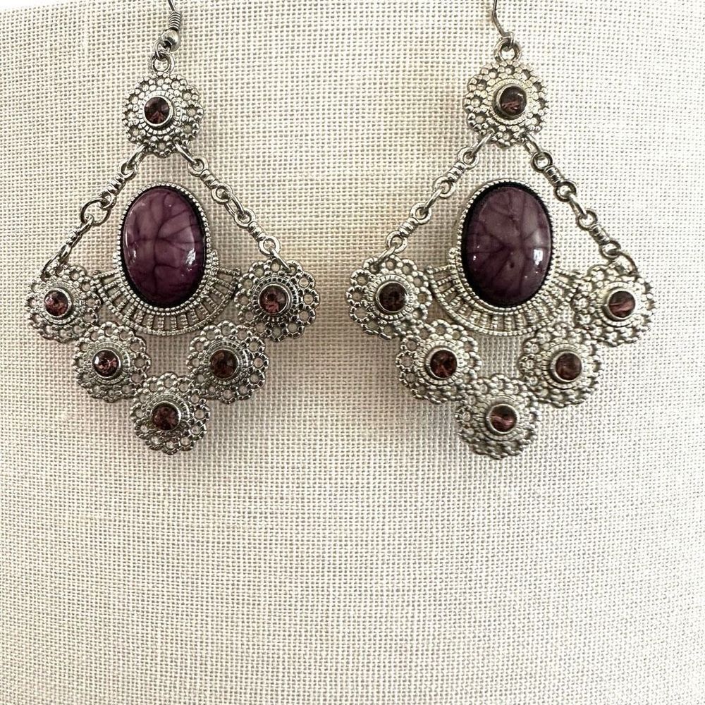 Silver tone and purple drop earrings